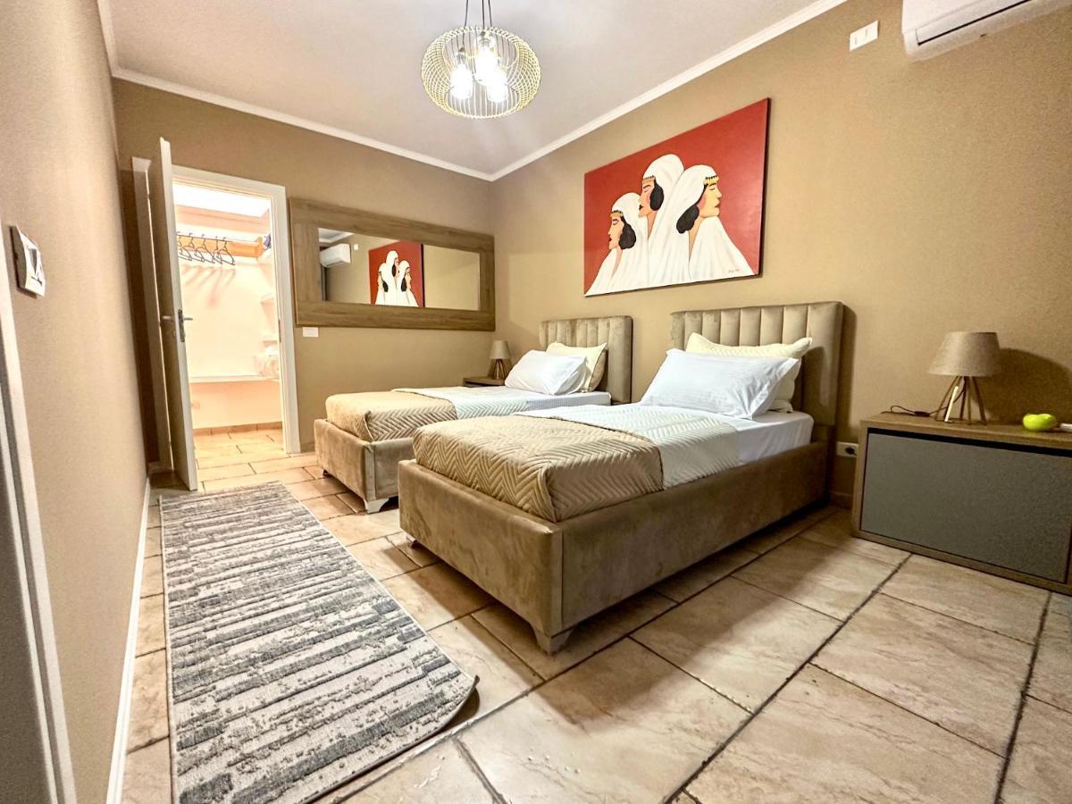 Amos City Center Apartment Tirana Eksteriør billede